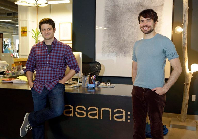 In this photo taken Thursday, April 3, 2014, Asana co-founders Dustin Moskovitz, left, and Justin Rosenstein, pose at the company's headquarters in San Francisco. Asana peddles software that combines the elements of a communal notebook, social network, instant messaging application and online calendar to enable teams of employees to share information and do most of their jobs without relying on email. (AP Photo/Eric Risberg)