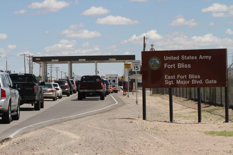 Cars wait to enter Fort Bliss in El Paso, Texas, Tuesday Sept. 9,  2014. The Army is ramping up security at Fort Bliss, its sprawling West Texas post near the US-Mexico border. The tighter security is to include random vehicle checks and access limited to Defense Department personnel at some of its gates. (AP Photo/Juan Carlos Llorca)