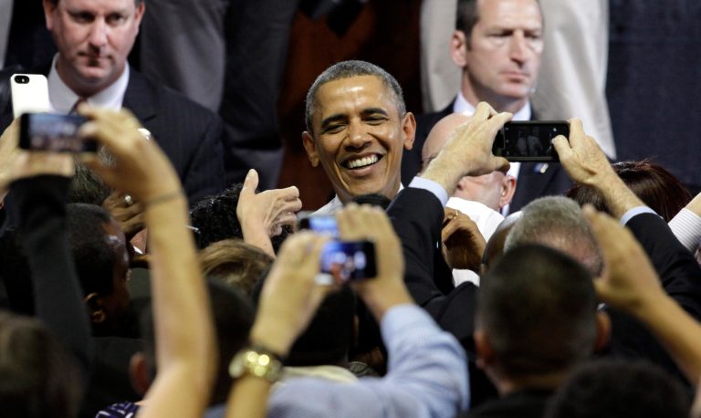 President Barack Obama greets people after speaking at Coral Reef High School, Friday, March 7, 2014 in Miami. Obama traveled to the Miami school to unveil a new initiative to ensure more students complete the Free Application for Federal Student Aid (FAFSA), a document required for most types of school financial aid such as Pell grants. (AP Photo/Javier Galeano)