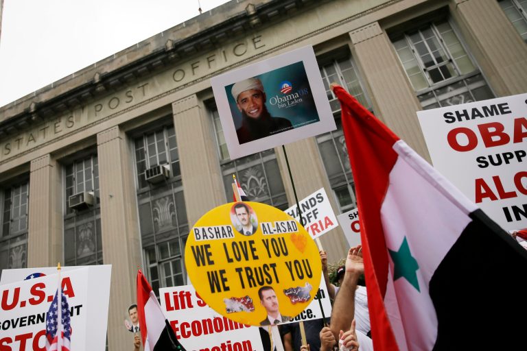 Members of the local Syrian community march in protest against the United States' involvement in Syria in Allentown, Pa., last week. (AP/Matt Slocum)