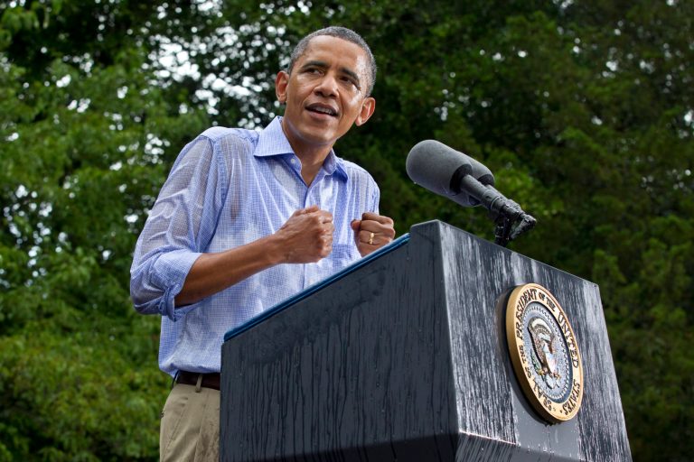 President Barack Obama holds a campaign rally in a downpour at the historic Walkerton Tavern & Gardens in Glen Allen, Va., near Richmond, Va., Saturday, July 14, 2012. It is in the Congressional district represented by House Majority Leader Eric Cantor, R-Va., a key county in a crucial swing state, part of a region that could decide the fight for Virginia's 13 critical electoral votes.   (AP Photo/J. Scott Applewhite)