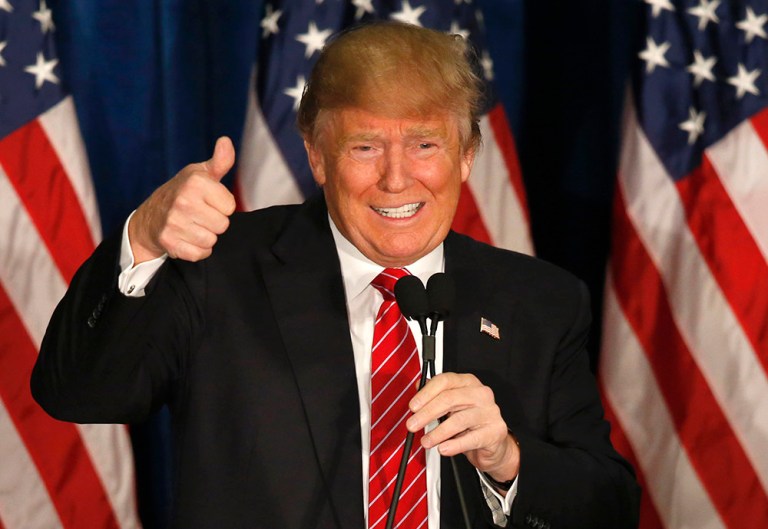 Donald Trump gives a thumbs-up as he finally speaks at campaign stop, in Portland, Maine. (AP Photo/Robert F. Bukaty)
