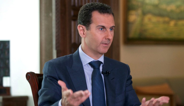 The Syrian government on Tuesday dismissed White House allegations that it was preparing a new chemical weapons attack, as activists reported an airstrike on an Islamic State-run jail in eastern Syria that they said killed more than 40 prisoners. (Syrian Presidency via AP, File)