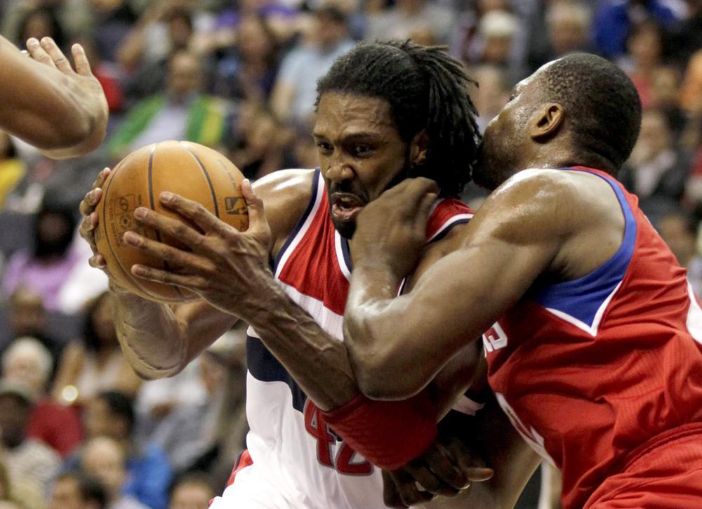 Wizards strangle Sixers, snap skid