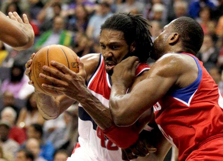 Wizards strangle Sixers, snap skid