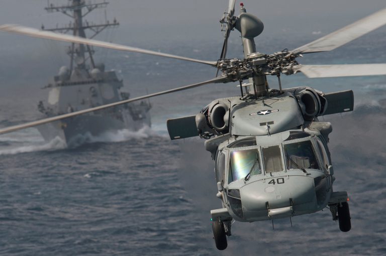 U.S. Air Force combat controllers conduct fast-rope insertion training using a U.S. Navy HH-60H Seahawk helicopter assigned to Helicopter Sea Combat Squadron (HSC) 84 at Hurlburt Field, Fla., May 2, 2014, during Emerald Warrior 2014. Emerald Warrior is a U.S. Special Operations Command-sponsored two-week joint/combined tactical exercise designed to provide realistic military training in an urban setting. (U.S. Air Force photo by Staff Sgt. Tim Chacon)