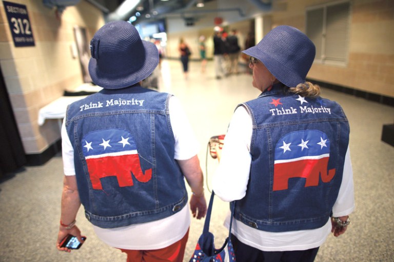Two women wear GOP logo cut-off jean jackets with matching blue hats during the third day of the Republican National Convention at the Tampa Bay Times Forum on August 29, 2012, in Tampa, Fla. (Chip Somodevilla/Getty Images)