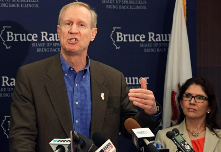 FILE - In this June 12, 2014 file photo, Illinois Republican gubernatorial candidate Bruce Rauner speaks at a news conference accompanied by his running mate Evelyn Sanguinetti  in Chicago. The issue of how Rauner's daughter got into an elite Chicago public high school has resurfaced in the Illinois governor's race. Rauner has maintained that he didn't use his money or influence to get a daughter into Walter Payton College Prep in 2008. Initially, she was rejected despite having top grades. Rauner has said his family appealed through a principals' discretionary process. (AP Photo/M. Spencer Green, File)