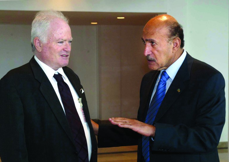 FILE - In this Thursday, March 10, 2005 file photo, then-Chief of intelligence Omar Suleiman, right, of Egypt, talks to Amos Gilad, a top aide to Israeli Defense Minister Shaul Mofaz, following Egyptian President Hosni Mubarak meeting with Mofaz, not pictured, at the Red sea resort of Sharm el-Sheik, Egypt. Israel's defense minister has repudiated remarks by a top official who called the Egyptian government a 