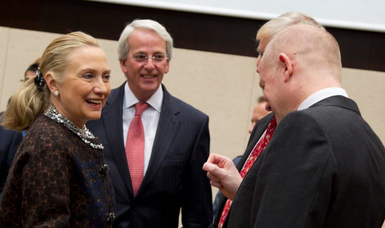   U.S. Secretary of State Hillary Clinton, left, speaks with British Foreign Minister William Hague, right, during a meeting of NATO foreign ministers at NATO headquarters in Brussels on Wednesday, Dec. 5, 2012. NATO foreign ministers were set Wednesday to shift their focus to the way forward in Afghanistan during a second day of talks in Brussels, as the military alliance prepares to withdraw its combat troops in 2014. (AP Photo/Virginia Mayo)  