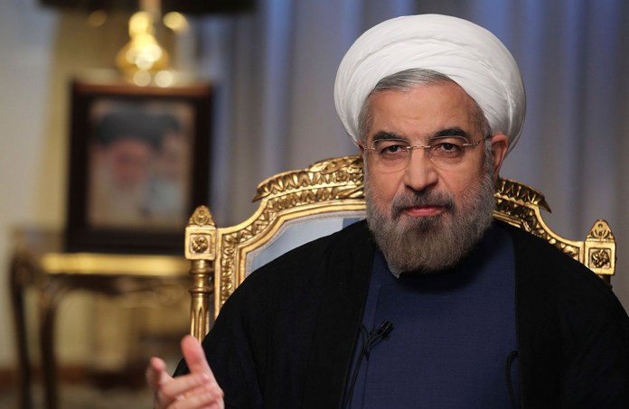 Iranian President Hassan Rouhani will speak at the United Nations on Tuesday for the first time, the same day President Obama is doing so. (AP/Rouzbeh Jadidoleslam)