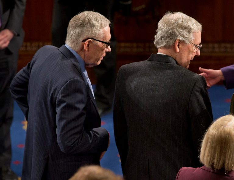 Senate Minority Leader Harry Reid of Nev., left, andÂ Senate Majority Leader Mitch McConnell, of Ky.,Â remain unwilling to tackle a legislative rewrite of a measure authorizing President Obama's use of military force in the Middle East.Â (AP Photo/Pablo Martinez Monsivais)