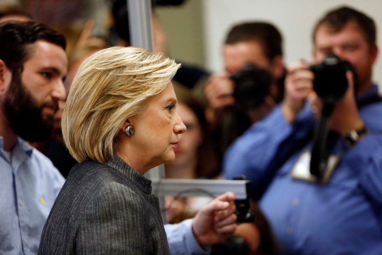 Democratic presidential candidate Hillary Rodham Clinton tours a lab with student Travis Lemieux, left, during a campaign stop at New Hampshire Technical Institute, Tuesday, April 21, 2015, in Concord, N.H. (AP Photo/Jim Cole)