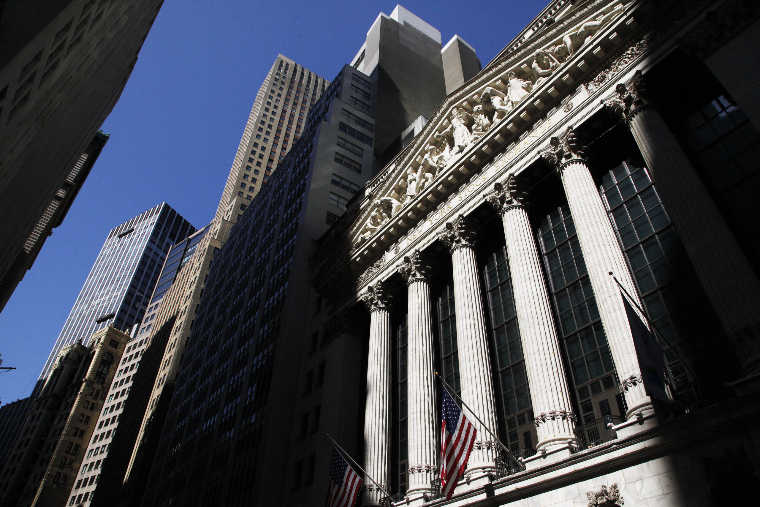 Stocks edge higher in early trading; Oracle slides