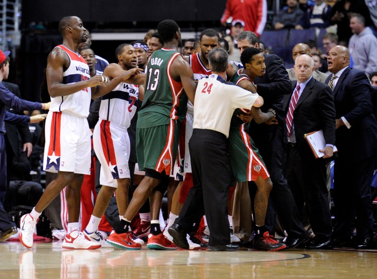 Nick Wass/AP
Players got heated after a hard foul by Bradley Beal, who was ejected at the end of a 101-91 loss to the Milwaukee Bucks.