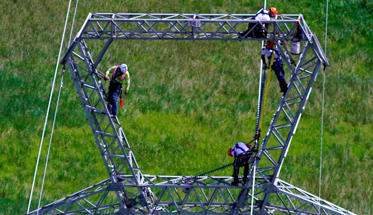 Several lawmakers have already demanded an investigation into why the island's bankrupt utility gave a $300 million contract to repair the devastated power grid to a small Montana for-profit firm. (AP Photo/Ramon Espinosa)