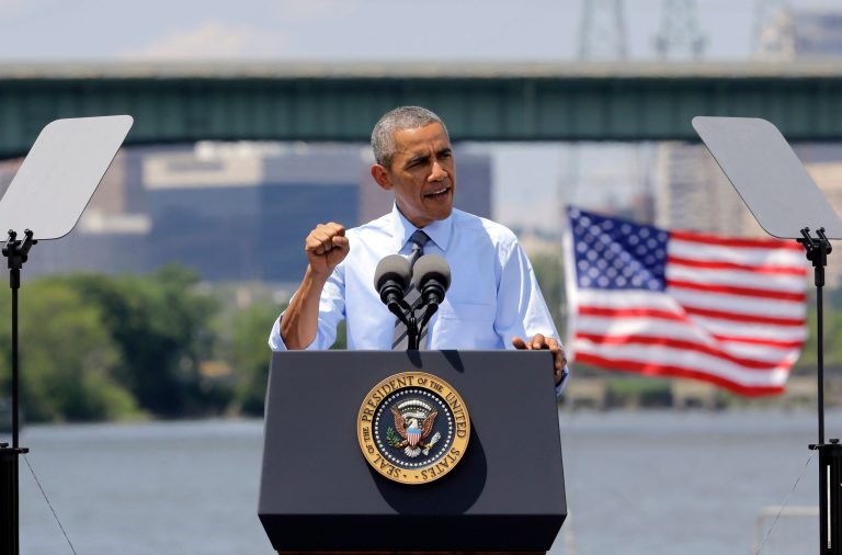 President Barack Obama speaks in front of the Interstate 495 bridge over the Christina River near Wilmington, Del., Thursday, July 17, 2014, to announce an initiative to increase private sector investment in the nation's infrastructure. The bridge was closed for emergency repairs last month after the discovery of four tilting support columns, and the federal government is helping pay for repairs. (AP Photo/Patrick Semansky)