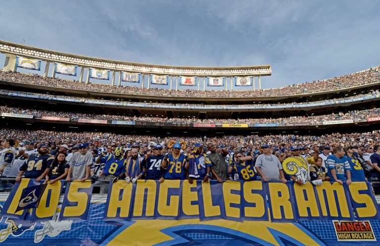 Fans of the St. Louis Rams hold a 'Los Angeles Rams' sign against the San Diego Chargers during their NFL Game on November 23, 2014 in San Diego, California. (Photo by Donald Miralle/Getty Images)
