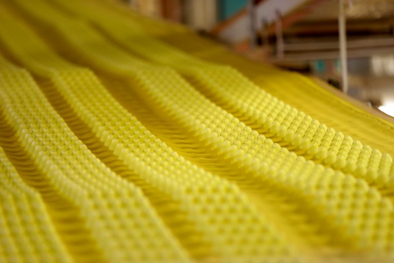 In this Wednesday, Feb. 13, 2013 photo, Peeps move through the manufacturing process before they receive their eyes at the Just Born factory in Bethlehem, Pa. With the storied candy brand celebrating its 60th anniversary this year, a quirky new TV ad campaign talks about all the things people do with their Peeps. (AP Photo/Matt Rourke)