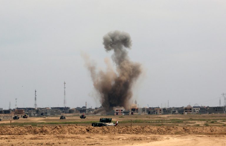 Smoke rises from central Tikrit as Iraqi security forces attack Islamic State extremist positions in Tikrit, 130 kilometers (80 miles) north of Baghdad, Iraq, Saturday, March 28, 2015. Â (AP Photo/Khalid Mohammed)