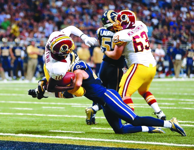 Jamie Squire/Getty Images
Robert Griffin III scored two touchdowns rushing and threw for another, but the Redskins lost on the road to the Rams on Sunday.
