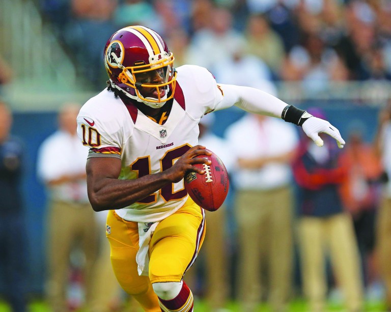 Jonathan Daniel/Getty Images
More than half the time Redskins quarterback Robert Griffin III dropped back to pass against Chicago on Saturday, he held the ball for approximately 3.2 seconds or more.