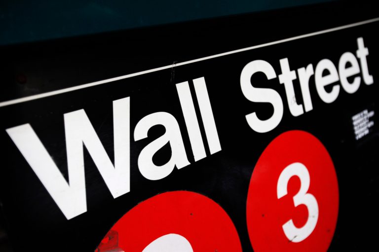 FILE - This Jan. 4, 2010 file photo shows an entrance to a Wall Street subway station in New York. U.S. stocks are edging lower in early trading Monday, Sept. 8, 2014, pulling the market back from a record high close last week. (AP Photo/Mark Lennihan, File)