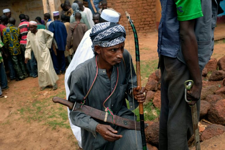 In this May 23, 2014 picture, Fulani civilians gather in Bambari, Central African Republic. In a report released Tuesday June 24, 2014,  the International Federation for Human Rights said that the tit-for-tat attacks against rival religious groups in Central African Republic threaten to create the conditions of a genocide reminiscent of Bosnia in the 1990s and requires swift efforts by the government and the international community to stop the violence. The 88-page report details the atrocities committed by both sides in this impoverished country and urged the re-establishment of a legal and penal system to stop the wave of crime and violence and begin trying those behind the massacres.(AP photo/Jerome Delay)