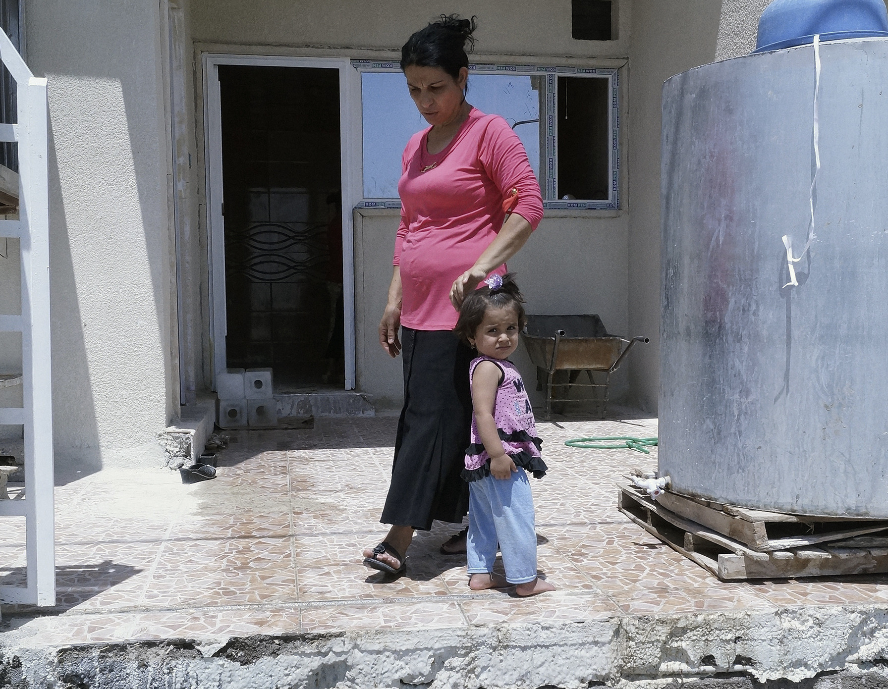 Iraq Christians flee with little more than clothes