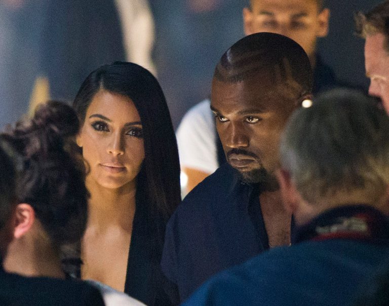Kim Kardashian and Kanye West arrive at the presentation of Lanvin's Spring/Summer 2015 ready-to-wear fashion collection, presented in Paris, France, Thursday, Sept. 25, 2014.  (AP Photo/Jacques Brinon)
