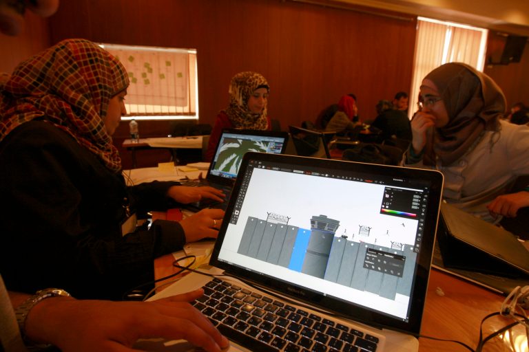 In this Friday, April 5, 2013 photo, Palestinian programmers attend a Ramallah Startup Weekend workshop in the West Bank city of Ramallah. The Palestinians are turning to their fledgling high-tech sector as they try to lay the groundwork for an independent state. Local entrepreneurs say their unique circumstances, including years of experience coping with Israeli travel restrictions, have fostered a creative spirit conducive to the entrepreneurial high-tech world.((AP Photo/Majdi Mohammed)