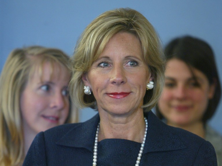 DeVos has long been politically active, dating all the way back to 1980. (AP Photo/Al Goldis)