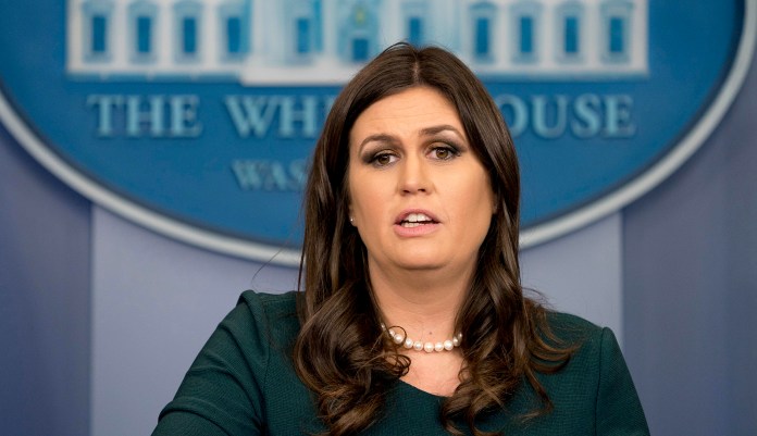 White House press secretary Sarah Sanders said that she knows that Democrats want to make the Niger attack on U.S. troops "a big negative attack piece" against President Trump, but said it's simply a "cheap attempt" to taint the president. (AP Photo/Andrew Harnik)