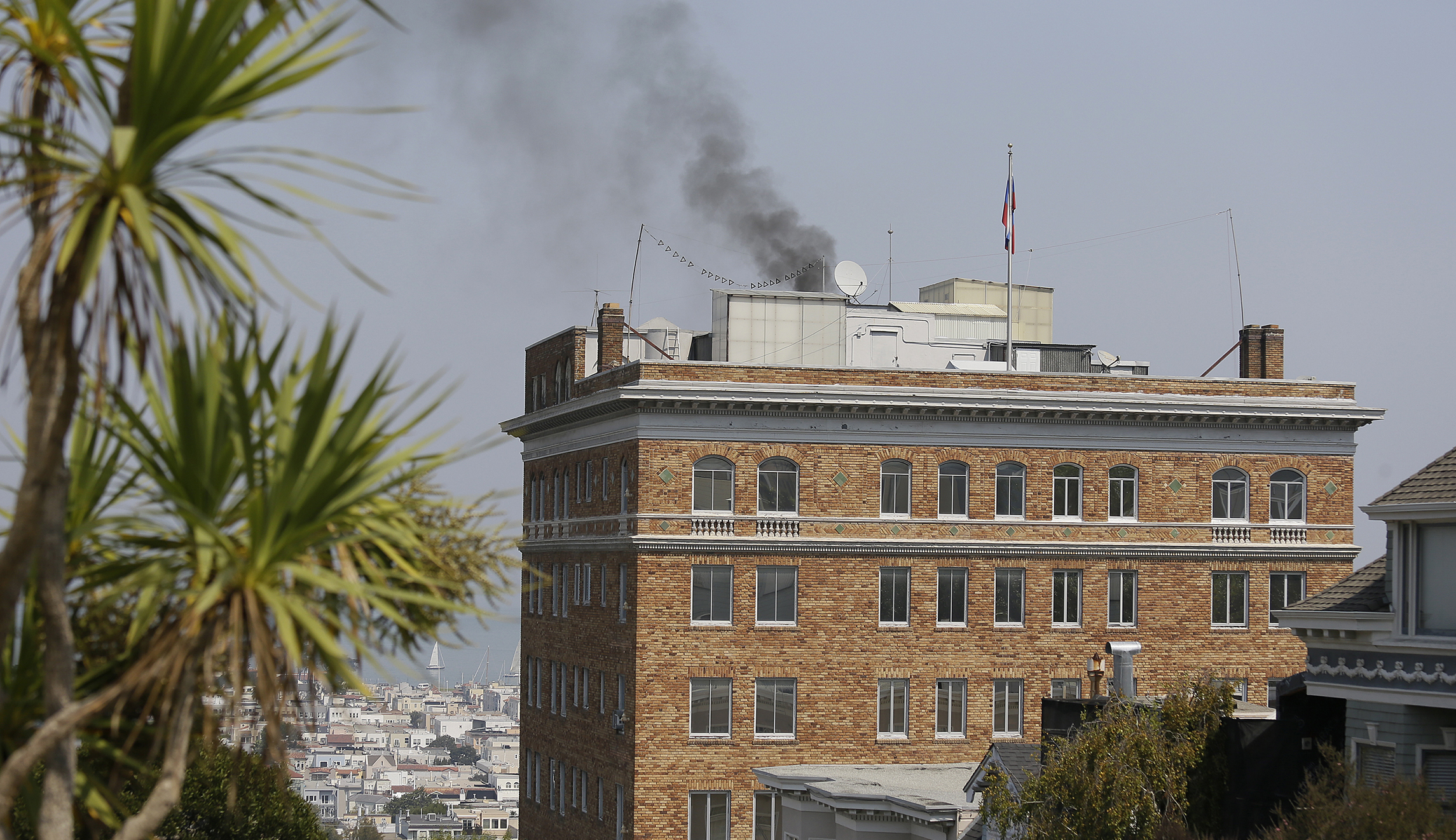 Smoke billows from Russian consulate in San Francisco on the eve of its closure