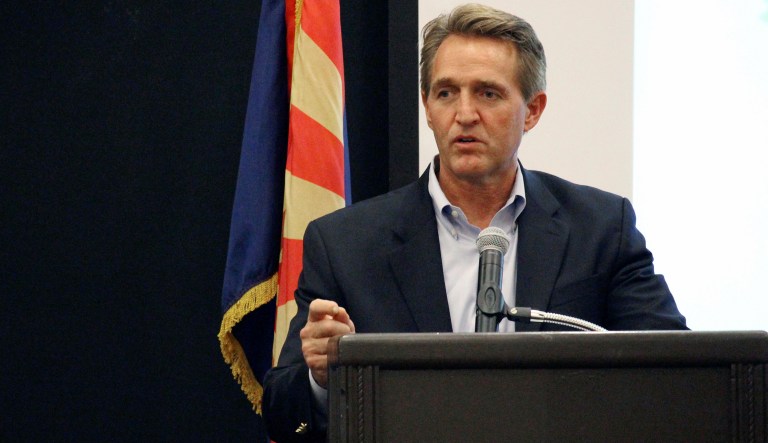 Sen. Jeff Flake made two completely true statements about the words President Trump used. That does not constitute a comparison. (AP Photo/Bob Christie)
