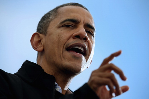 MADISON, WI - NOVEMBER 05:  U.S. President Barack Obama addresses a rally during the last day of campaigning in the general election November 5, 2012 in Madison, Wisconsin. Obama and his opponent, Republican presidential nominee and former Massachusetts Gov. Mitt Romney are stumping from one 'swing state' to the next in a last-minute rush to persuade undecided voters.  (Photo by Chip Somodevilla/Getty Images)