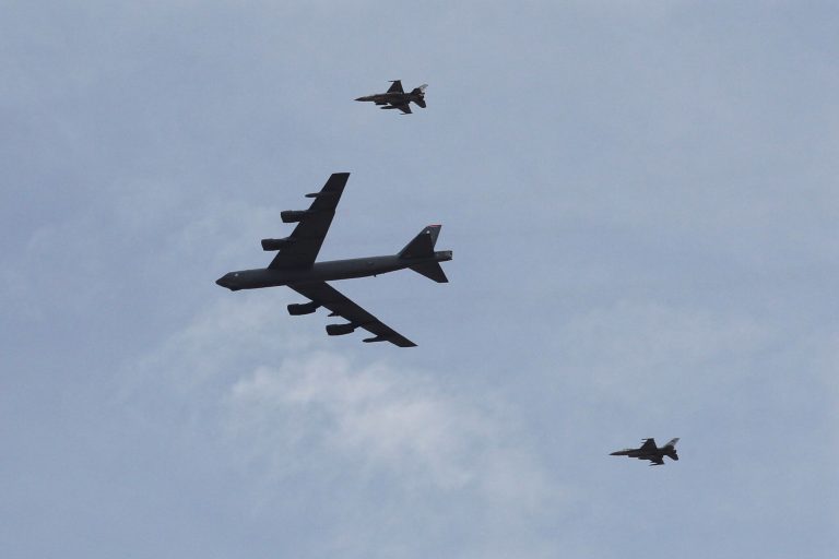 The overflight is the second U.S. operation in the past month in a region where the Chinese claim ownership. (AP Photo/Raad Adayleh)