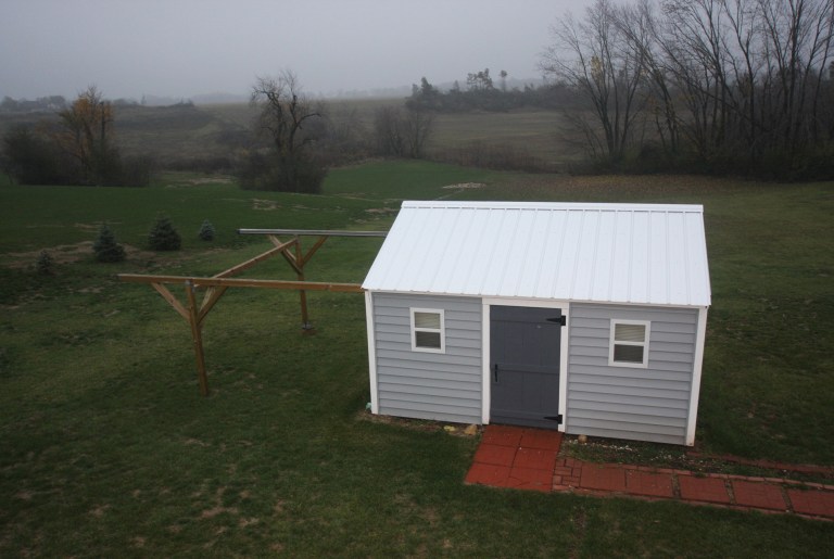   This Oct. 23, 2012 photo provided by Scott Jamieson shows Jamieson's home observatory when it is not in use in Eagle, Wis. The roof rolls onto support beams to give him a view of the entire night sky. (AP Photo/Scott Jamieson, Scott Jamieson)  