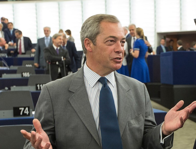 Nigel Farage, left, ex-leader of the British UKIP party, advises Donald Trump not to let Hillary Clinton get under his skin in the next debate. (AP Photo/Jean-Francois Badias)