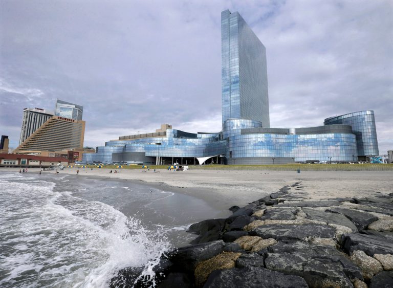 FILE - In this Monday, Sept. 1, 2014 file photograph, the closing Revel Casino Hotel, right, is seen next to the already closed Showboat Casino Hotel in Atlantic City, N.J. When the $2.4 billion Revel Casino Hotel on the Atlantic City Boardwalk, closed, it was the most spectacular and costly failure in Atlantic City's 36-year history of casino gambling. On Tuesday, Sept. 30, 2014, a bankruptcy court auction for Revel is scheduled to resume. An auction that began a week earlier was suspended due to the Rosh Hashanah holiday. (AP Photo/Mel Evans, File)
