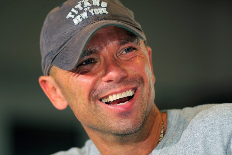   FILE - This June 1, 2012 file photo shows Country singer Kenny Chesney at a news conference to promote his 