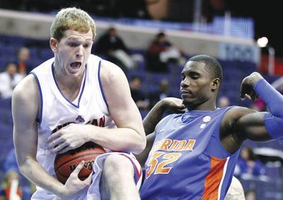Luis M. Alvarez/AP
Center Stephen Lumpkins averaged 13.5 points and 8.2 rebounds as a junior last year for American.