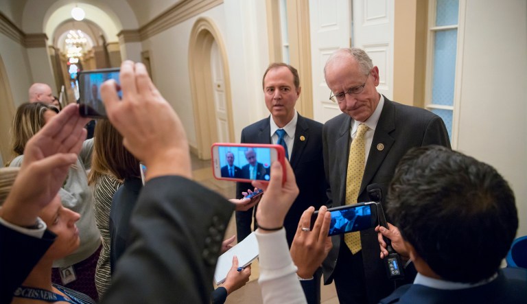 The leaders of the House Intelligence Committee, Rep. Adam Schiff, D-Calif., left, and Rep. Mike Conaway, R-Texas, emerge from a closed-door meeting. The committee voted unanimously to release the transcript 