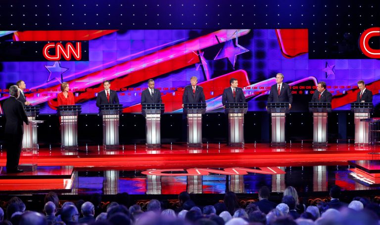 From left, John Kasich, Carly Fiorina, Marco Rubio, Ben Carson, Donald Trump, Ted Cruz, Jeb Bush, Chris Christie, and Rand Paul respond to debate moderator Wolf Blitzer, far left, during the CNN Republican presidential debate in Las Vegas. (AP Photo/John Locher)