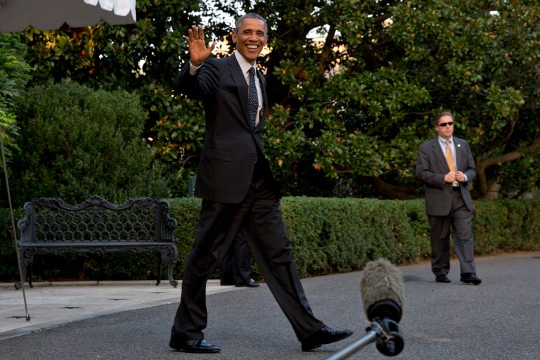 President Barack Obama waves as he leaves the White House to board the Marine One helicopter en route to Chicago from Washington, Wednesday, Oct. 1, 2014, after a meeting with Israeli Prime Minister Benjamin Netanyahu and the announcement of the resignation of Secret Service Director Julia Pierson amid a recent White House security breach. (AP Photo/Jacquelyn Martin)