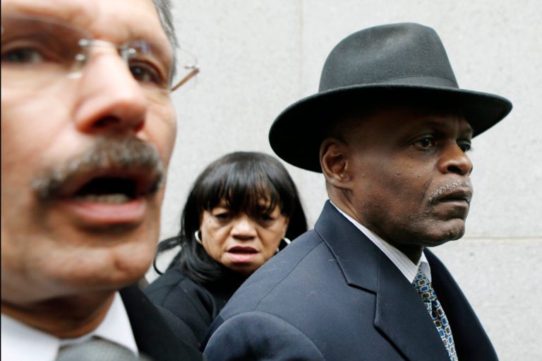 Former Pittsburgh police chief Nathan Harper, right, who pleaded guilty to stealing police funds by depositing them into unauthorized credit union accounts, leaves federal court in Pittsburgh with his wife, Cynthia Harper, center, and his attorney Robert Del Greco, left, after being sentenced to 18 months in prison on Tuesday. (AP Photo/Keith Srakocic)