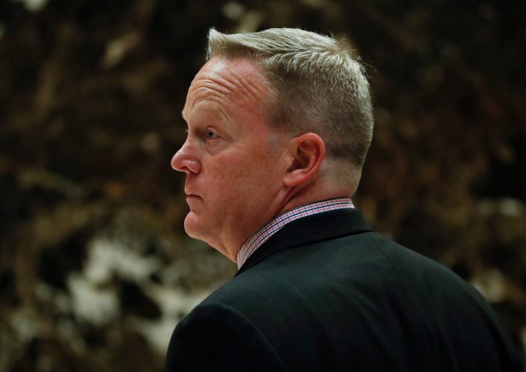 Sean Spicer, Republican National Committee communications director and chief strategist, waits for an elevator as he arrives at Trump Tower, Wednesday, Nov. 16, 2016, in New York. (AP Photo/Carolyn Kaster)