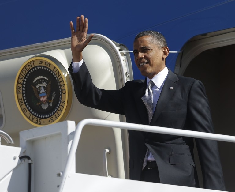 President Barack Obama waves upon his arrival on Air Force One at Buckley Air Force Base, Wednesday, Oct. 3, 2012, in Aurora, Colo. (AP Photo/Pablo Martinez Monsivais)