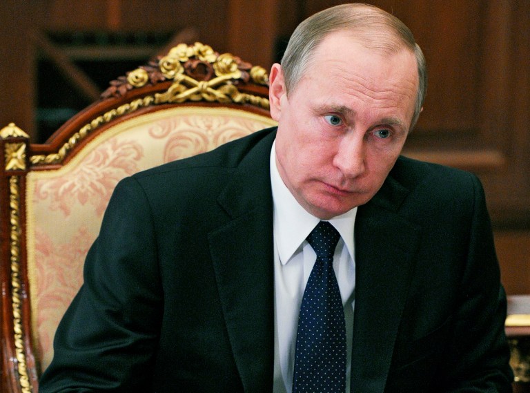 The leak also reportedly reveals a $2 billion offshore money trail that leads to Russian President Vladimir Putin and his associates. (Mikhail Klimentyev/Sputnik, Kremlin Pool Photo via AP)