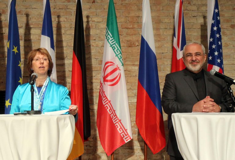 European foreign policy chief Catherine Ashton, left, and Iranian Foreign Minister Mohammad Javad Zarif, right, address the media after closed-door nuclear talks in Vienna, Austria, Saturday, July 19, 2014. (AP Photo/Ronald Zak)
